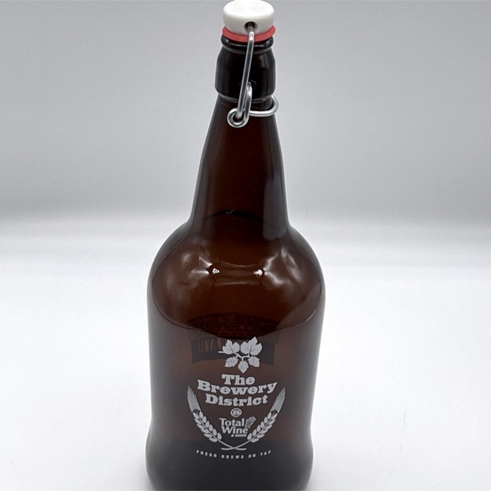 THE BREWERY DISTRICT GROWLER EMPTY BOTTLE.